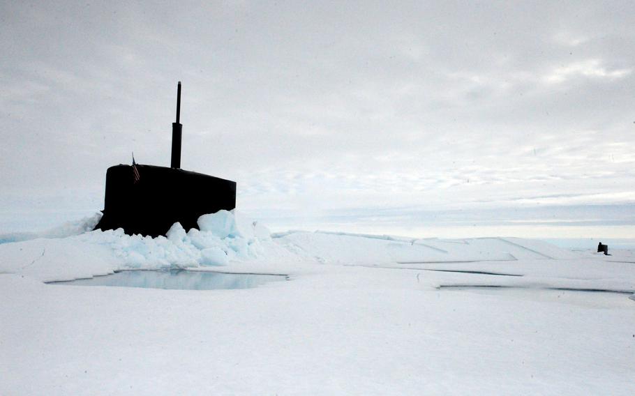 The fast attack submarine USS Seawolf is submerged after surfacing through the arctic ice July 30, 2015. U.S. military officials will hold talks this week in Greenland about security in the arctic. A top concern is China, which is investing heavily in the high north and beyond in Europe.