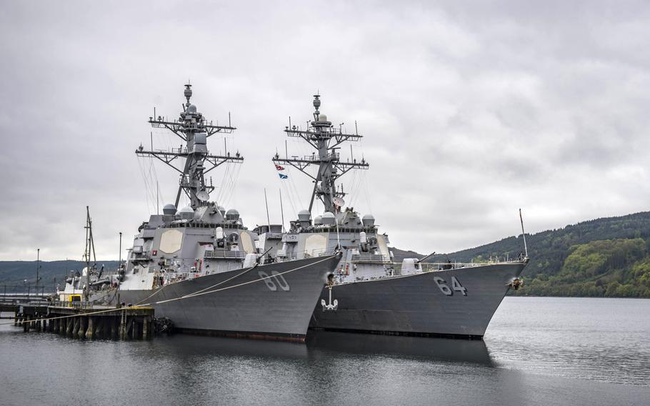 The destroyers USS Roosevelt, left, and USS Carney are moored abreast in Faslane, Scotland, May 7, 2019, before participating in exercise Formidable Shield.