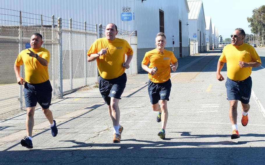 Sailors assigned to Navy Operational Support Center North Island finish a 1.5 mile run during the spring physical readiness test April 7, 2019, on Naval Air Station North Island, San Diego, Calif. The Navy has issued guidelines to halt physical training of sailors who show unusual distress and let them make up the training another day.