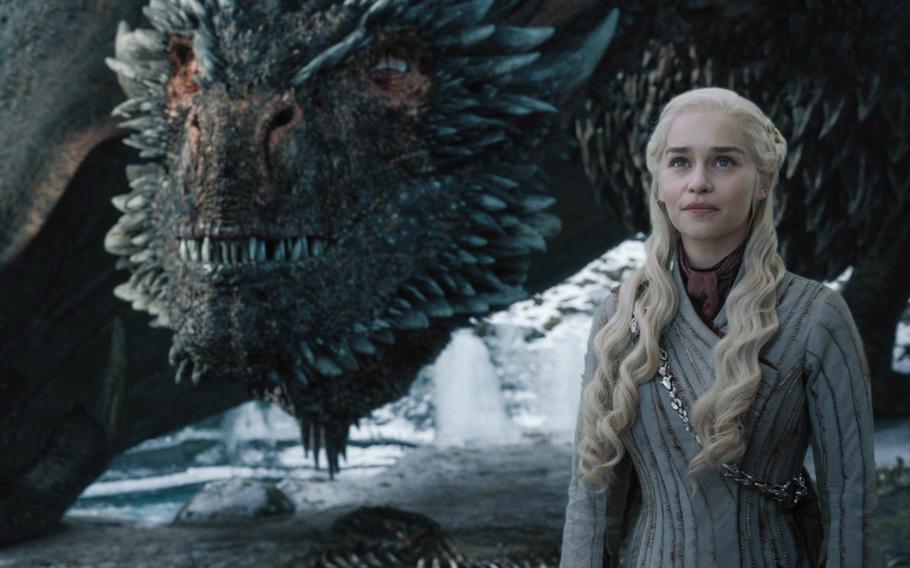 Emilia Clarke as Daenerys Targaryen in HBO's Game of Thrones next to her dragon, Drogon. Soldiers and Marines who spoke with Stars and Stripes had different opinions in how dragons should have been used tactically in the series.