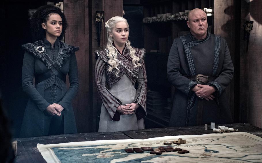 Missandei, left, Daenerys Targaryen and Lord Varys strategize during HBO's ''Game of Thrones.''