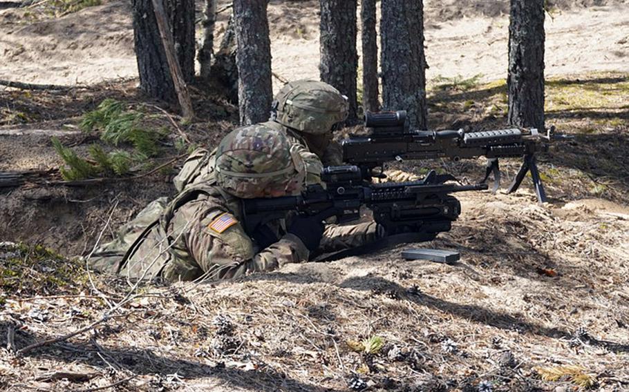 Soldiers with the U.S. Army's 2nd Cavalry Regiment provide cover during Exercise Arrow in the Pojankangas Training Area in Finland.