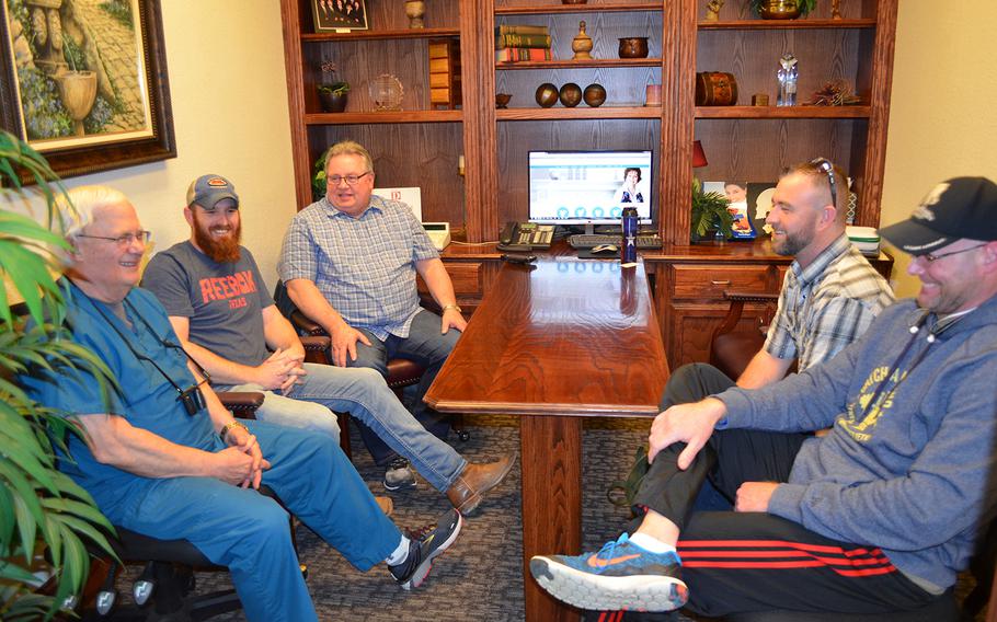 Dr. David Wilhite reconnects with five veterans he provided with free dental work through the nonprofit Rebuilding America???s Warriors at his office in Plano, Texas on March 6. Wilhite has helped more than 50 veterans in about three years. Rose L. Thayer/Stars and Stripes