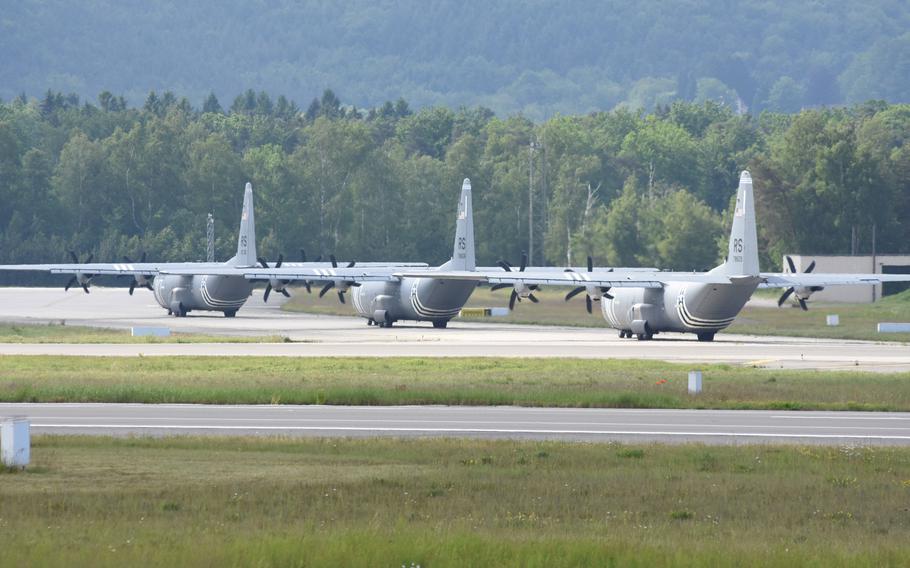 Three C-130J from the 37th Airlift Squadron at Ramstein Air Base, Germany, taxi down the runway Wednesday, May 29, 2019, prior to taking off for Normandy, France. Four planes and about 40 personnel from the squadron will participate in events next week marking the 75th anniversary of D-Day.
