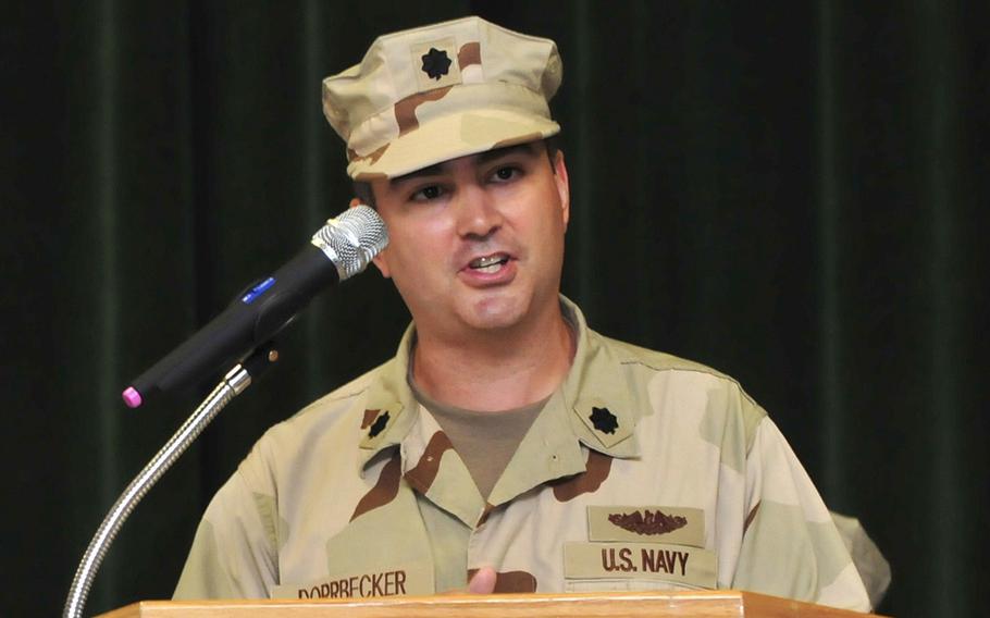 Then-Cmdr. Alan Dorrbecker, delivers a speech at a change of command ceremony in Guantanamo Bay, Cuba, Aug. 24, 2011. An appeals court last week affirmed the verdict and 8-year prison sentence handed to Capt. Dorrbecker for attempted sexual abuse.