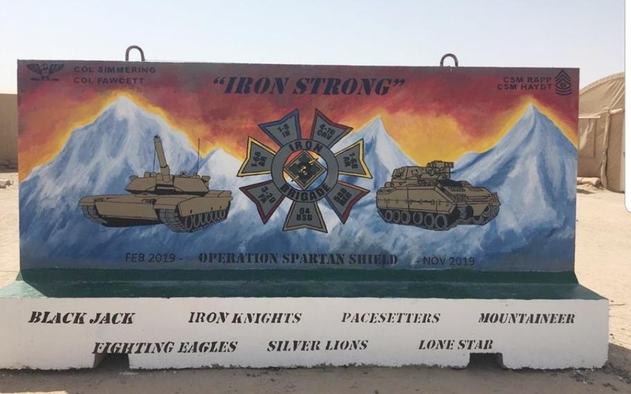 This photo taken on Thursday, June 6, 2019, shows a mural for the 3rd Armored Brigade Combat Team painted on a T-wall at Camp Buehring, Kuwait. 1st Lt. Shelby DePriest, an infantry soldier with 1st Battalion, 8th Infantry Regiment, 3rd ABCT, 4th Infantry Division, helped organize a group of soldiers to paint the mural and was awarded an Army Commendation Medal for her efforts.