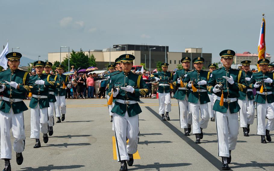 Members of South Korea's Army Ground Operations Command Honor Guard perform during the Eighth Army 75th anniversary celebration at Camp Humphreys, South Korea, Saturday, June 8, 2019.