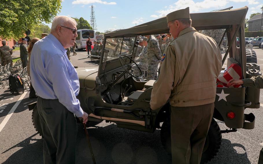 Dewey R. Christopher, left, and Fred Duffield, right, talk while looking over a 1945 Ford GPW at RAF Mildenhall on Friday, June 21, 2019. Mildenhall's Professional Development Center was named after Christopher, in recognition of his Army Air Force service as a B-17 crew chief and his services to the East Anglian community.