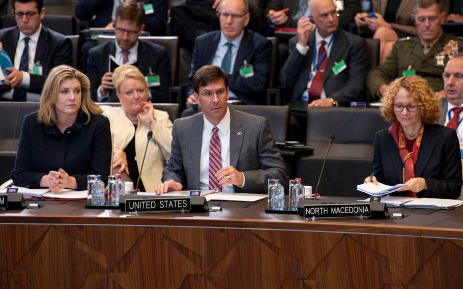 Acting Defense Secretary Mark Esper, center, during the NATO defense ministers meeting in Brussels, Belgium, Thursday, June 27, 2019.