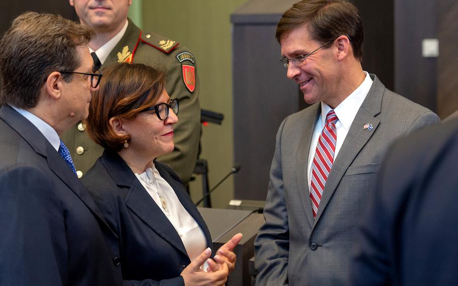 Acting Defense Secretary Mark Esper talks with Elisabetta Trenta, Italy's defense minister during the second day of meeting at  NATO headquarters in Brussels, Belgium, Thursday June 27, 2018.