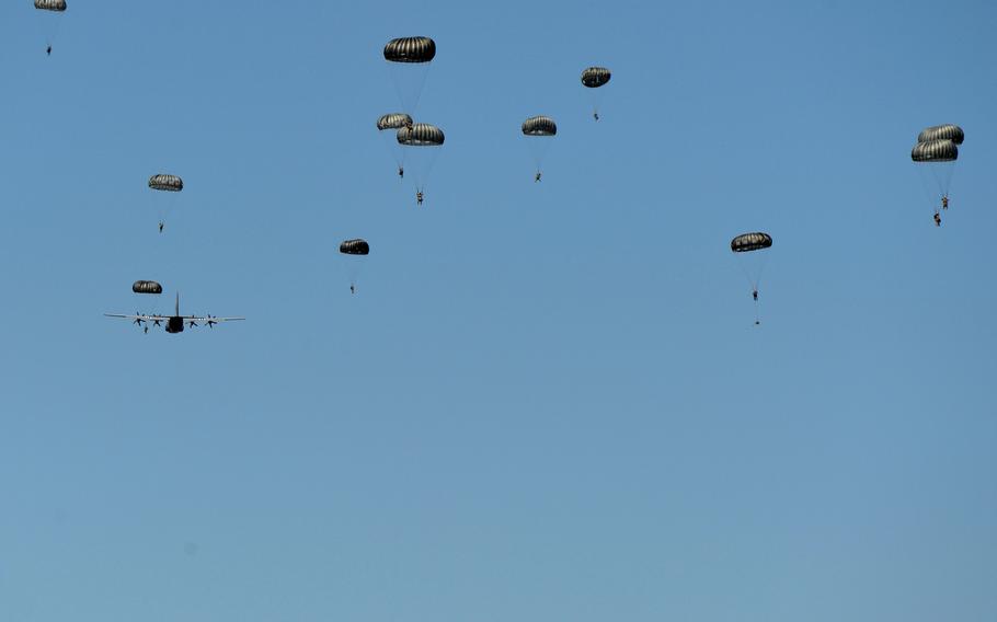 Paratroopers assigned to the 435th Contingency Response Group at Ramstein Air Base, Germany, jump out of a 37th Airlift Squadron C-130 Hercules over the air base Tuesday, July 2, 2019.