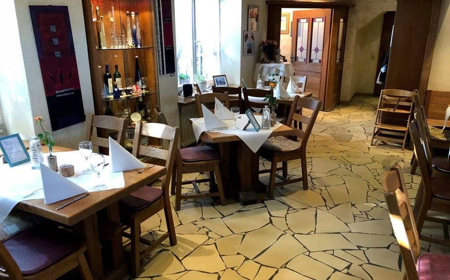 The interior seating at BurgRestaurant at Lichtenberg Castle in Thallichtenberg, Germany, is open and inviting.