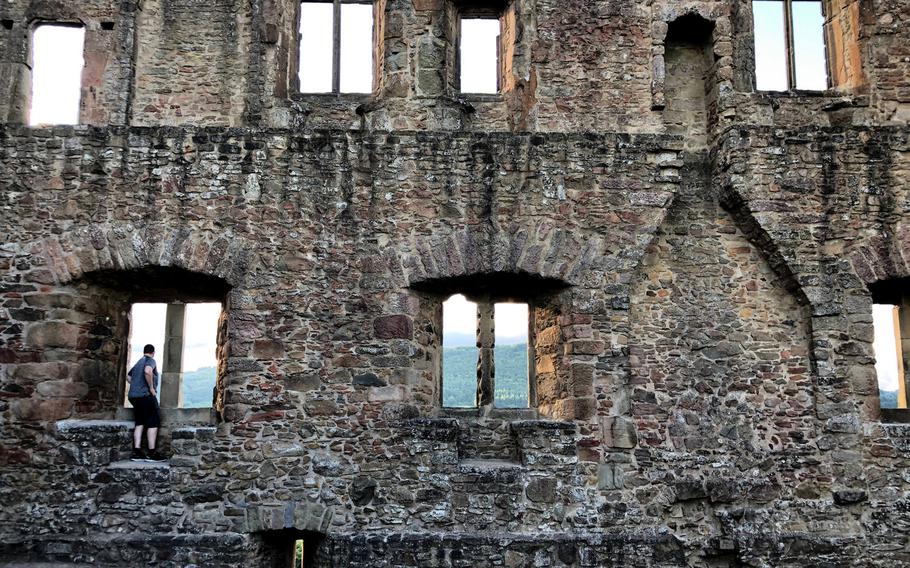 Perry Aston looks down on the town of Thallichtenberg, Germany, after eating dinner at BurgRestaurant at Lichtenberg Castle.