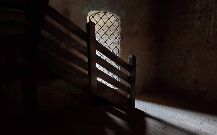 Light coming through a window illuminates a small room at Lichtenberg Castle in Thallichtenberg, Germany.