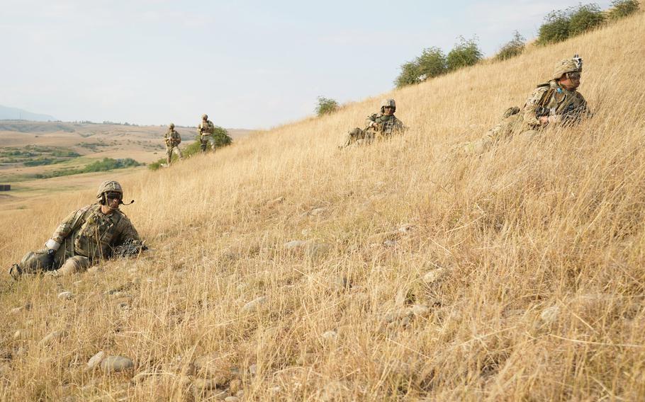 U.S. soldiers, assigned to 2nd Squadron, 2nd Cavalry Regiment, stop to pull security as they advance to the simulated enemy targets for the live-fire exercise during Agile Spirit 19 near Tbilisi, Georgia, July 29, 2019.
