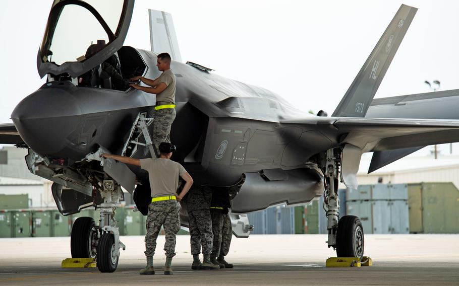 Crew chiefs with the 421st Aircraft Maintenance Unit work on an F-35A Lightning II returning to Hill Air Force Base, Utah, July 31, 2019, after a two-month European deployment. 