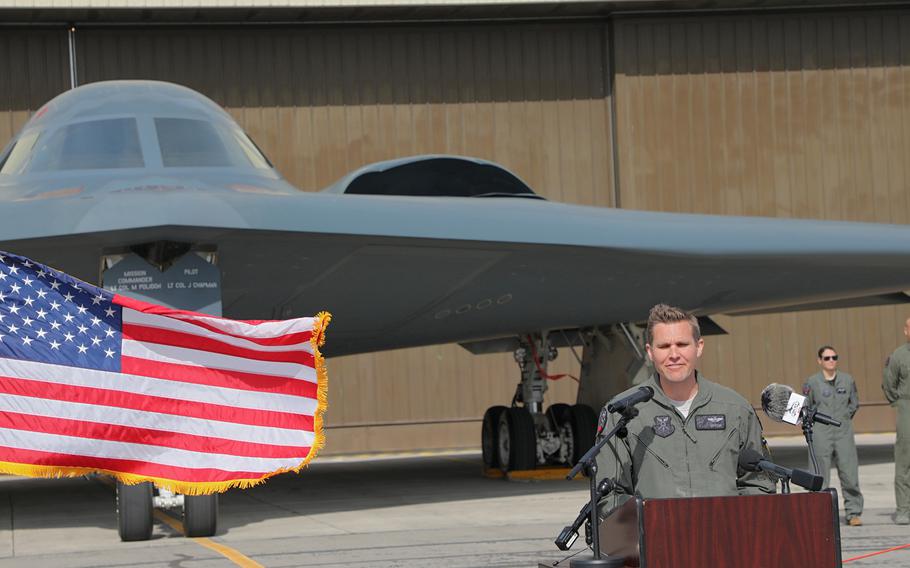 Lt. Col. Robert N. Schoeneberg, Bomber Task Force commander, 393rd Expeditionary Squadron, speaks in front of a B-2 Spirit Bomber at RAF Fairford, England, Aug. 30, 2019