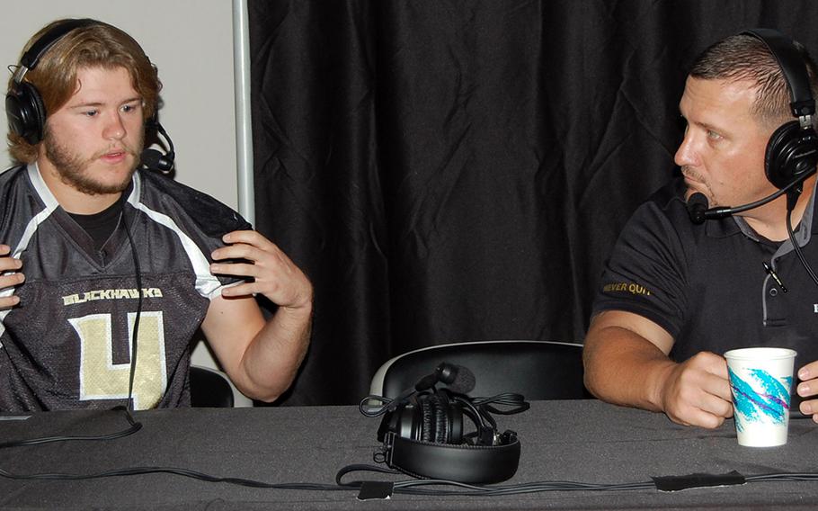 Humphreys High School senior football player Brent Carver and coach Steven Elliott take turns co-hosting "Breakfast with Sports Byline" at the Camp Humphreys, South Korea, Sept. 5, 2019.