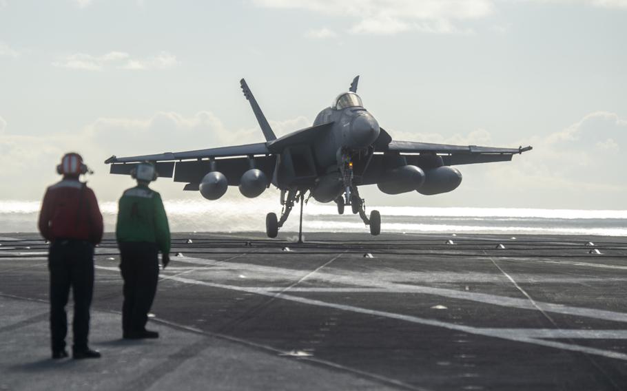 An F/A-18E Super Hornet lands on the flight deck of the USS Harry S. Truman in the Atlantic Ocean on Sunday, Dec. 1, 2019. The Truman strike group is conducting operations in the U.S. 6th Fleet's area of responsibility.