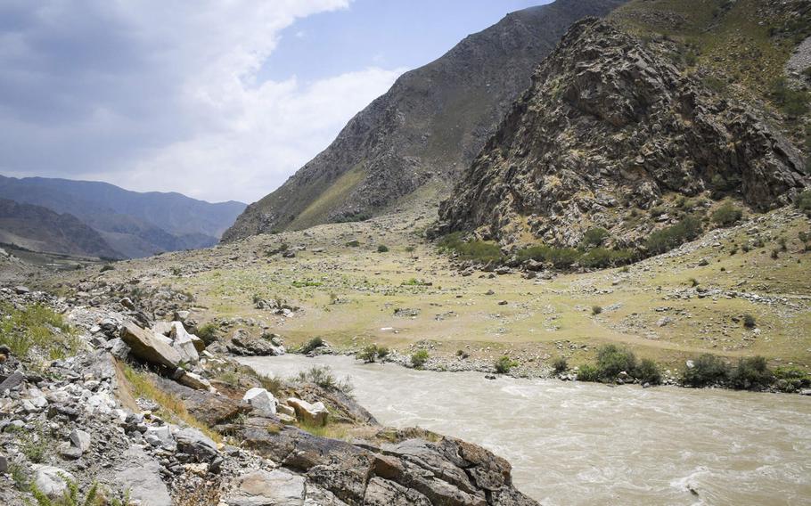A swollen river roars through a mountain valley in Afghanistan's eastern  Badakhshan province July, 2019. The Afghan government last week terminated the contracts for an American company, Centar Ltd., which aimed to begin work on a gold mine project in the mountainous region.