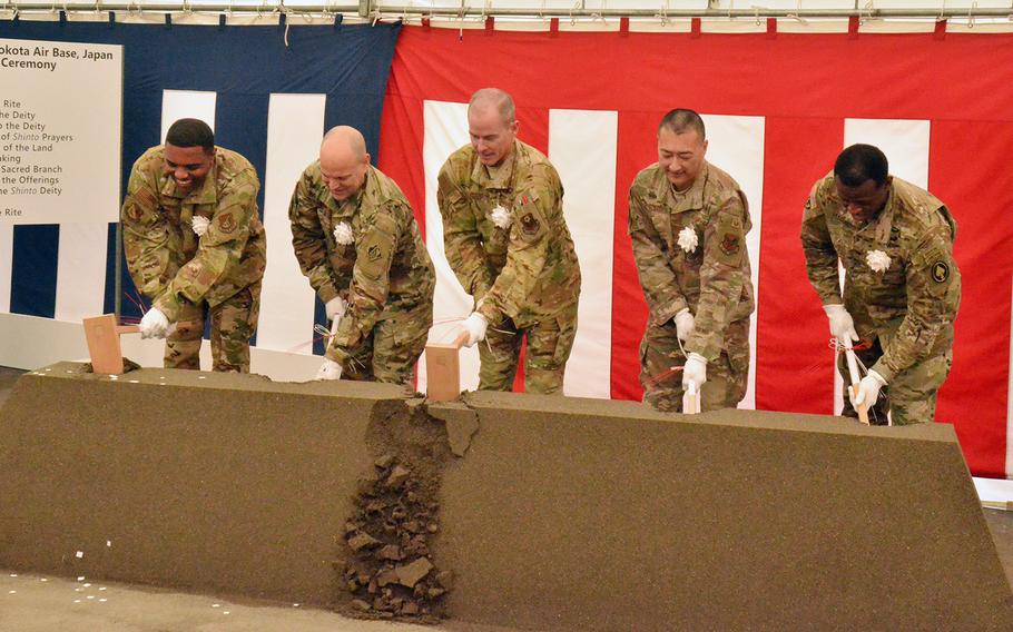 Military leaders break ground to kick off construction for CV-22 Osprey facilities at Yokota Air Base, Japan, Thursday, Dec. 5, 2019.