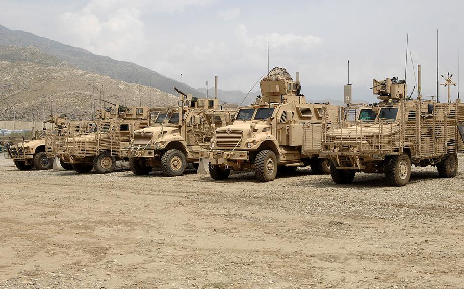 Mine Resistant Ambush Protected (MRAP) vehicles stand in a row before going out on a mission in eastern Afghanistan. A whistleblower case alleges that a defense contractor, Navistar, bilked the Pentagon out of more than $1 billion on a contract to build MRAP vehicles.