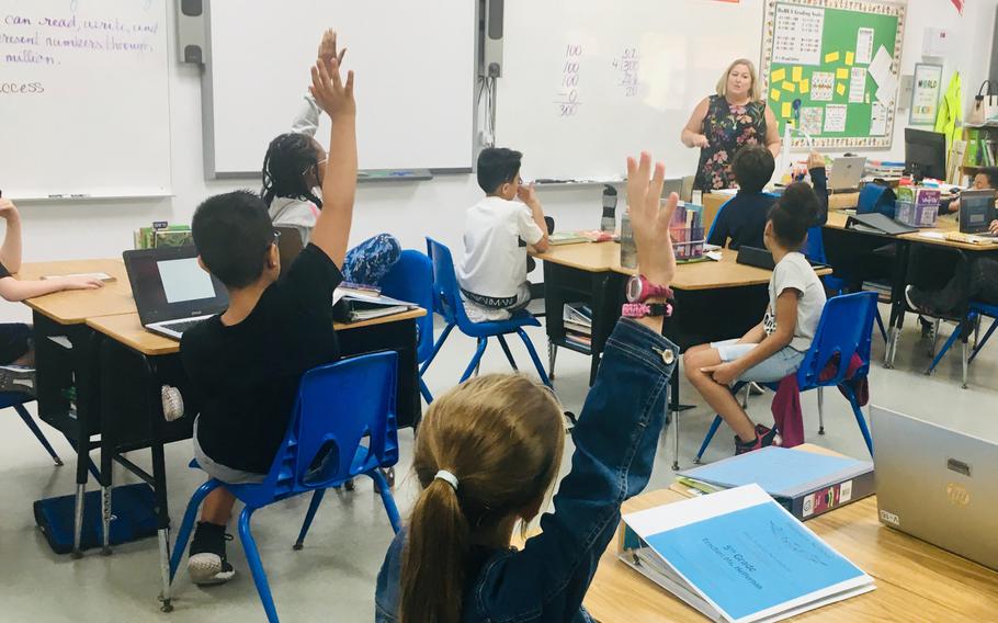 Heather Heffernan, a fifth grade teacher at the Bahrain School, interacts with her students in September of 2019. The school was closed Monday, Dec. 9, 2019, by order of the king following a big win by the Bahrain national soccer team.