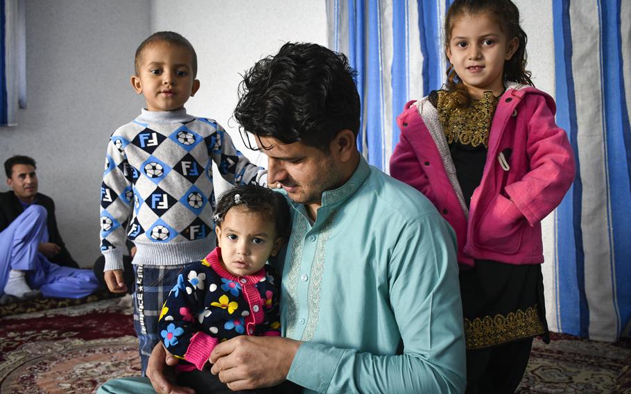Zabihullah Bayan, 29, a former Afghan interpreter for the U.S. military, prepares to leave Kabul, Afghanistan, with his family on a special immigrant visa, on Oct. 10, 2019. The program, which was due to expire, is slated to be extended by Congress.