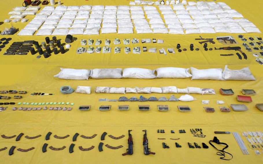 Arms seized from allegedly Iran-backed militants in Bahrain are shown here in a Bahraini government photo from March 3, 2018. The bomb components seized by Bahrain between 2013 and 2018 were similar to those found in weapons intended for Yemen in 2013, London-based Conflict Armament Research said in a report published on Tuesday, December 17, 2019.