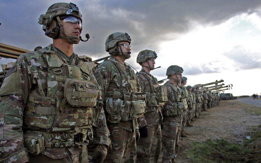 U.S. Army soldiers from the 3rd Infantry Division line up to meet U.S. and Polish dignitaries during a event at Drawsko Pomorskie Training Area, Poland, in support of Defender-Europe 20, March 11, 2020. The Pentagon ordered a halt to the deployment of forces for the exercise, which will be sharply curtailed because of concerns about the coronavirus, U.S. European Command said Monday.
