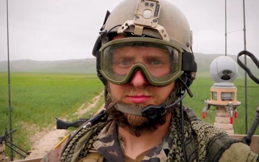 Green Beret Kevin Flike takes a selfie while on patrol in an Army Ground Mobility Vehicle in Baghlan province, Afghanistan, in 2010.