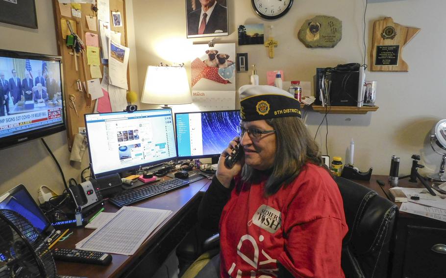 Jennifer Havlick, an Army veteran and a member of American Legion Post 109 in northern Minnesota, calls fellow veterans on March 28, 2020. American Legion members hope to keep its each other connected during the coronavirus pandemic through ''enhanced buddy checks,'' in which members ask veterans if they need help with anything, including groceries or chores.