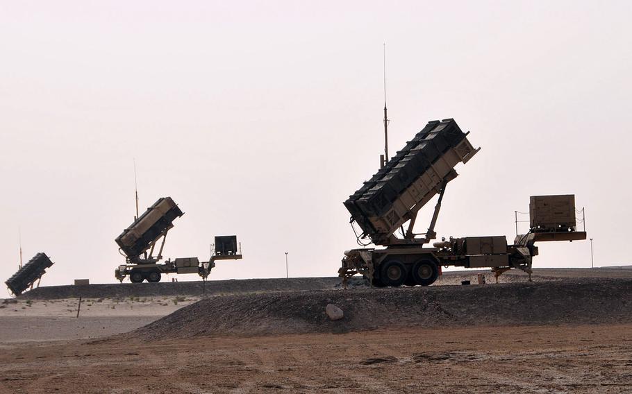 A set of three U.S. Army  Patriot missile launchers stand ready to defend against airborne threats at an undisclosed location in southwest Asia in 2014. The U.S. has been deploying Patriot missile batteries in Iraq as a war of words between Washington and Tehran appears to be escalating tensions.