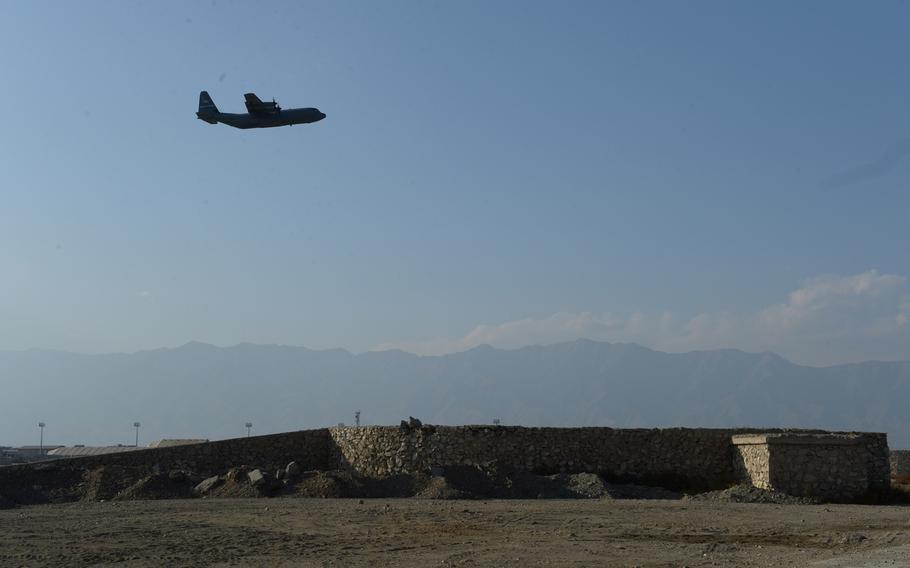 A U.S. aircraft takes off at Bagram Airfield in 2016. Six Afghan workers at Bagram were killed about 500 yards from the base by a gunman Thursday, an Afghan official said.