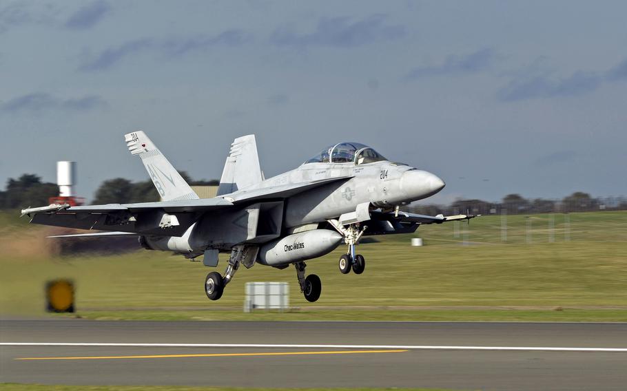 A U.S. Navy F-18 Super Hornet takes off from RAF Lakenheath, England, in October 2018, during an exercise. The German military will buy 30 American Super Hornets and 15 F-18 Growlers to replace what remains of its aging fleet of Tornado jets, German news magazine Der Spiegel reported on Sunday, April 19, 2020.