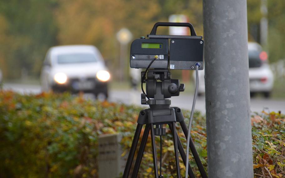 A speed camera enforces the speed limit on a German roadside. New traffic regulations that take effect Tuesday,  April  28, 2020, in Germany say drivers who are caught exceeding the speed limit in town by 13 mph or by 16 mph on the highway,  can lose their license for a month.