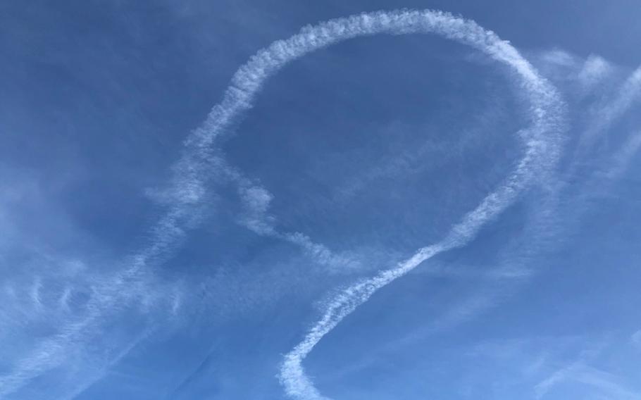Vapor trails in the sky over Kaiserslautern, Germany, shortly after a sonic boom was heard, May 8, 2020. The booms heard across the state of Rheinland-Pfalz were German Eurofighter jets breaking the sound barrier during training flights.