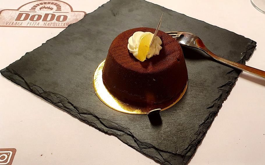 A chocolate tartufo from DoDo, Verace Pizza Napoletana in Sacile, Italy.  Tartufo is a traditional Italian ice cream dessert, usually made with one or more ice cream flavors.