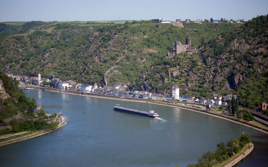 A ship passes St. Goarshausen and Burg Katz as it plies the Rhine River as seen from the viewing platform on top of Lorelei rock, 410 feet above the river.