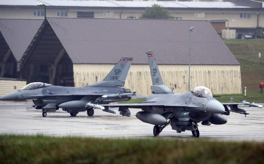 U.S. Air Force F-16 Fighting Falcons taxi toward a runway  at Spangdahlem Air Base, Germany. The squadron would move from Spangdahlem to Aviano Air Base, Italy, under a plan announced by Defense Secretary Mark Esper on Wednesday, July 29,  2020, to cut the number of troops in Germany by nearly 12,000.