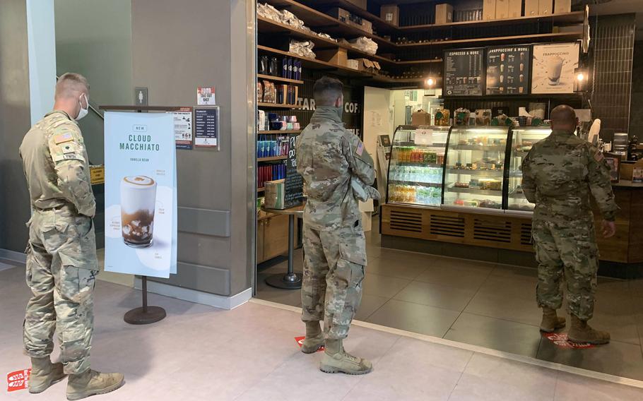 Soldiers on Tower Barracks inside the post exchange Starbucks, in Grafenwoehr, Germany, could move to Italy under the plan announced by Defense Secretary Mark Esper on Wednesday, July 29, 2020, to withdraw nearly 12,000 U.S. troops from Germany.