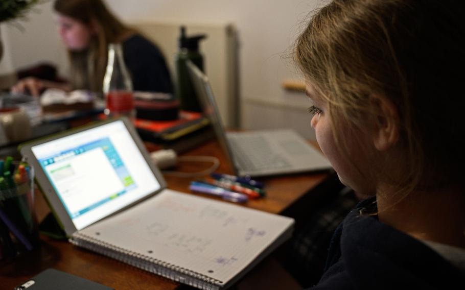 Kendal Morgenweck, a student at Hohenfels Elementary School, Germany, does her daily online assignments at home in March 2020, during the coronavirus lockdown. The parents of about 9,000 DODEA students have opted to have their children attend school virtually for the first semester of the 2020-21 school year.