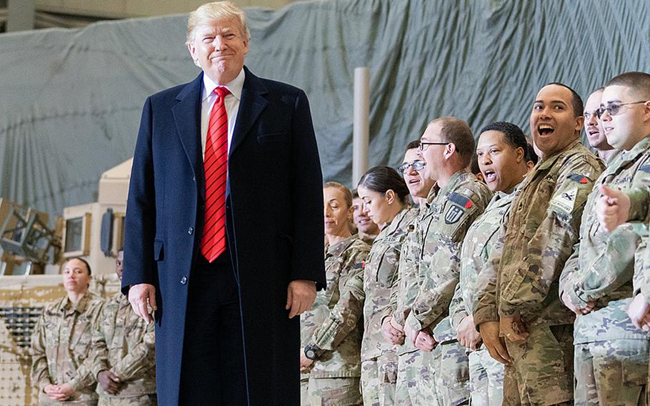 President Donald Trump visits troops at Bagram Airfield, Afghaistan on November 28, 2019, during a surprise Thanksgiving stopover. Trump said in an interview with Axios that aired Aug. 3, 2020, that he expects fewer than 5,000 U.S. troops to remain in Afghanistan by November.