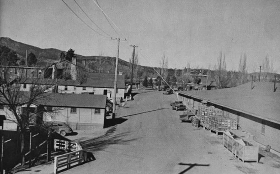 This undated photograph shows a street view of Los Alamos during the Manhattan Project era.