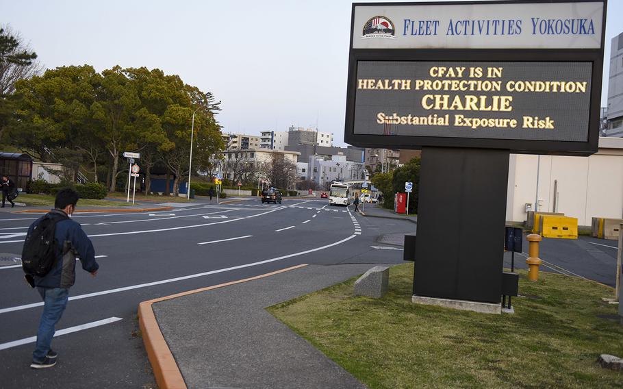 A sign displays the health-protection condition in late March at Yokosuka Naval Base, Japan.