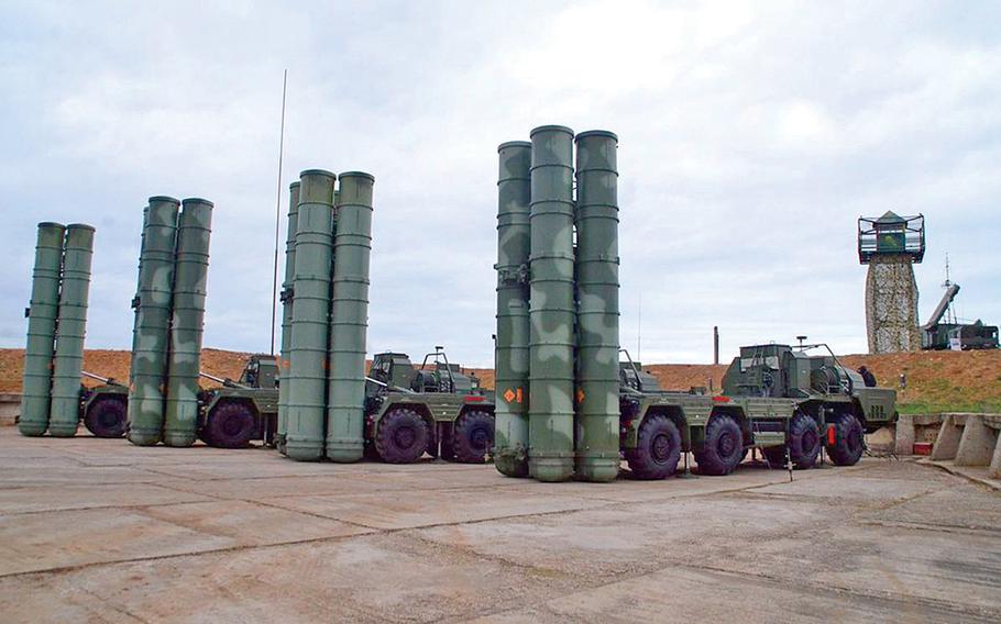 Russian S-400 surface-to-air missile launchers are seen in Sevastopol in 2018. Russia plans to deliver a second S-400 surface-to-air missile system to Turkey, despite warnings from Washington that Ankara faces sanctions if it deploys the system, Russian state news reported.