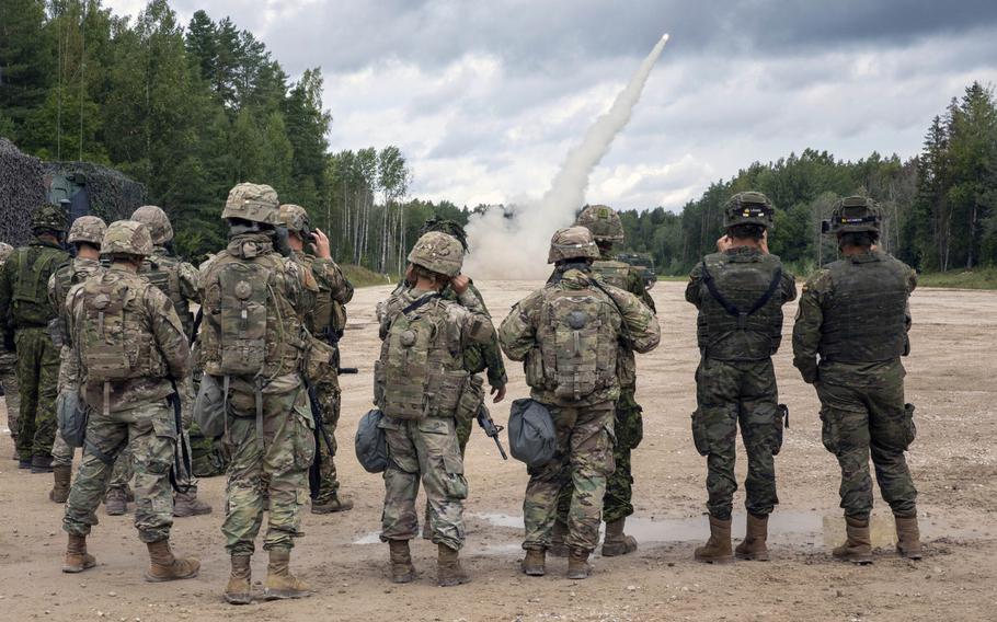 U.S. soldiers, along with Estonian Defense Force troops and other NATO allies and partners watch as a rocket takes flight during a live-fire exercise in Tapa, Estonia Sept. 5, 2020. The exercise was the first live-fire drill outside Germany for the U.S. Army's 41st Field Artillery Brigade since they were reactivated in Nov. 2018.