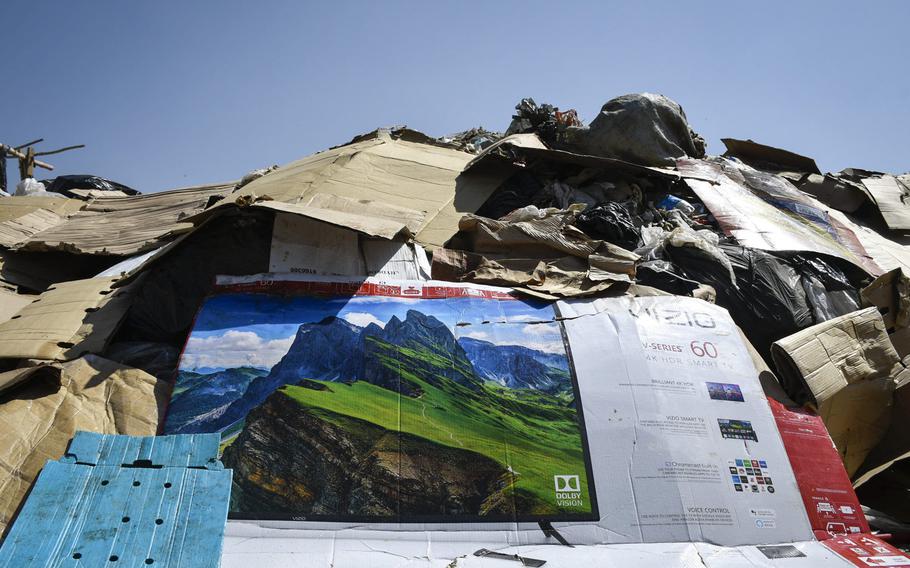 Trash from the U.S. Embassy accumulates at what the Afghan government says is an illegal dump, two miles east of the airport in Kabul, Afghanistan, on Aug. 17, 2020.