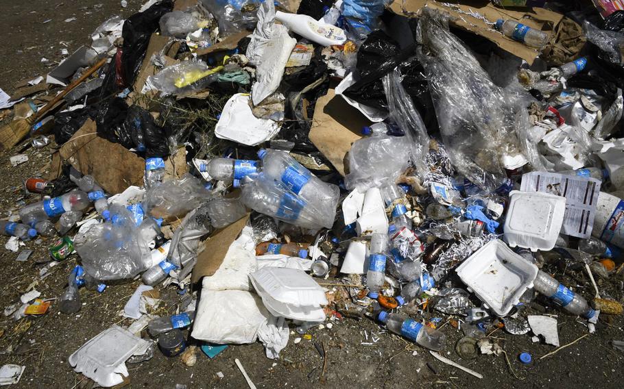 Trash from the U.S. Embassy accumulates at what the Afghan government says is an illegal dump, two miles east of the airport in Kabul, Afghanistan, on Aug. 17, 2020.