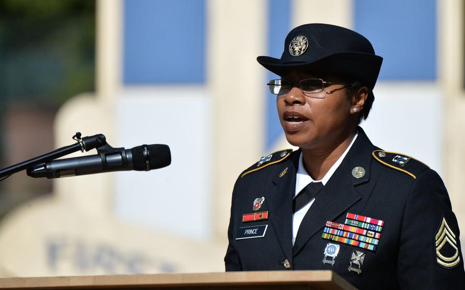 Sgt. 1st Class Tonya Prince sings the national anthems of the United States and Germany at the 9/11  remembrance ceremony hosted by the 21st Theater Sustainment Command in Kaiserslautern, Germany, Sept. 11, 2020.